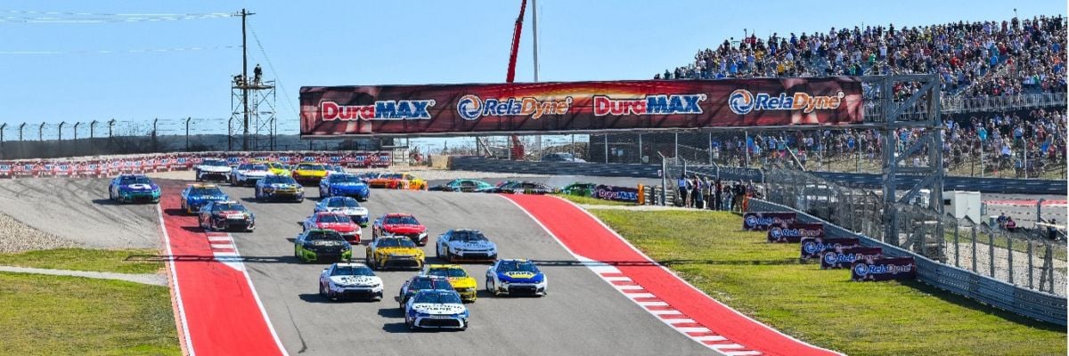 Chase Briscoe leads the charge through Turn 1 on the opening lap of the 2026 DuraMAX Texas Grand Prix Powered by RelaDyne.